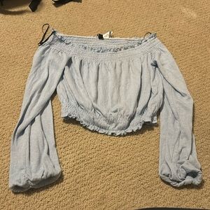 Light blue cropped going out top